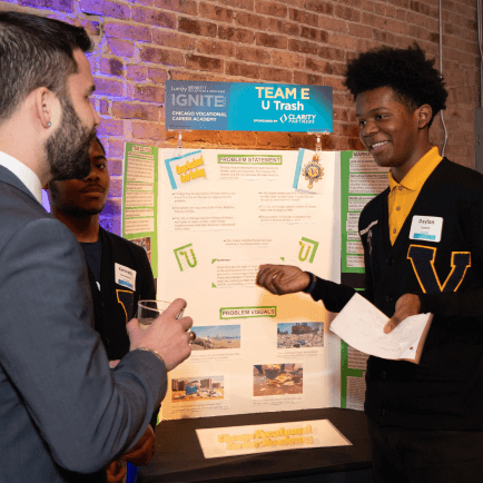 Student presenting project at event